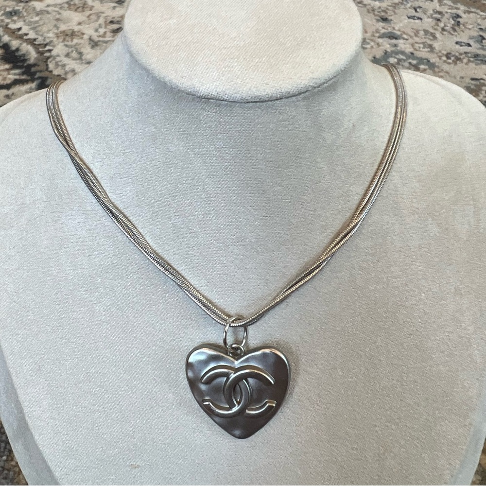 Upcycled charm with triple snake chains